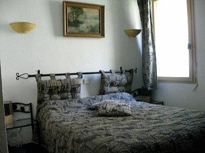 טריגאנס Logis Hotel Le Vieil Amandier חדר תמונה